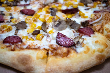 Close up view of fresh and delicious pizza. Pizza toppings.