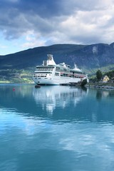 Cruise ship in Norway. Filtered colors style.
