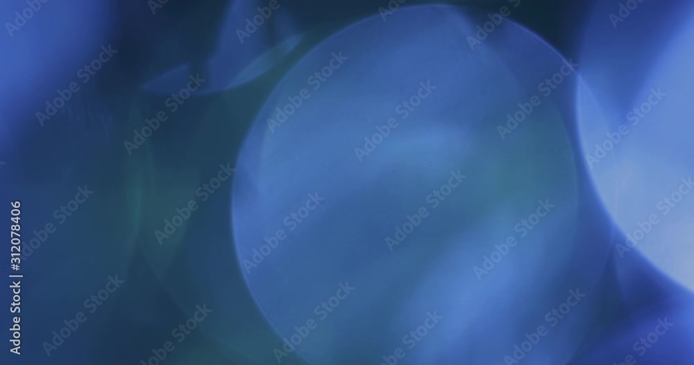 Wall mural abstract bokeh light background for overlay. real lens flare light effect. sparkle ray leak on black