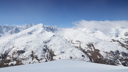Fototapeta na wymiar Winter Alps in France - winter ski resort landscape