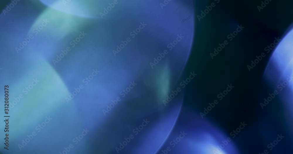 Poster abstract bokeh light background for overlay. real lens flare light effect. sparkle ray leak on black