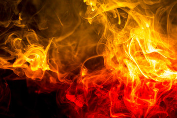 Fototapeta premium Colored smoke on black background