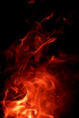 Fototapeta premium Red smoke on black background