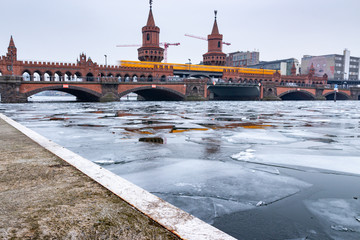 Ice Shells on the Spree at Oberbaum bridge in Berlin