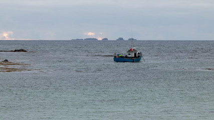 fishing boat in the sea. Outer hebrides, scotland