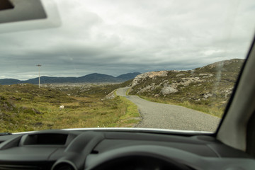 drivers view of road through mountains