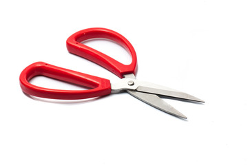 red scissors on a white background