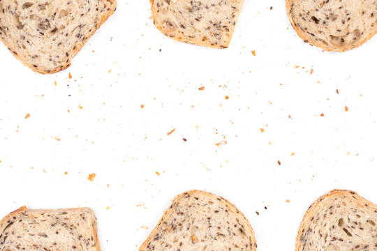 sliced breads with crumbs on the white background.