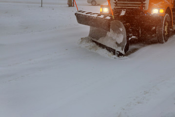 Municipal equipment removing snow outdoors cleaning roads in winter