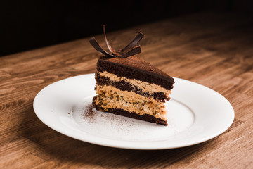 a beautiful piece of chocolate cake with cream