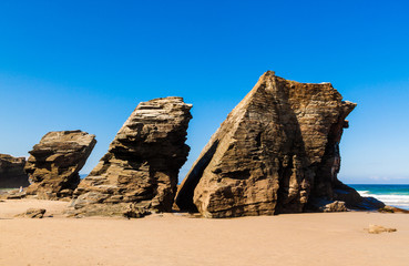 Wonderful stone figures. Eroded beach coastline. Cathedrals beach at the Atlantic Ocean, Cantabric coast Lugo, Galicia, Spain - Playa de las Catedrales.