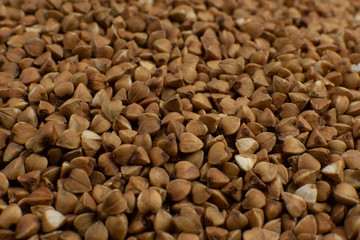 Background and texture of Buckwheat. Roasted buckwheat. Garnish. Ingredient. Dietary product.