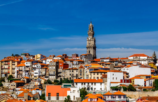 Old town Porto with tower Clerigos (Torre dos Cl&eacute;rigos) view with colorful houses, Portugal.