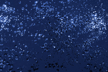 blue bokeh glitter defocused lights background. Christmas and New Year concept.