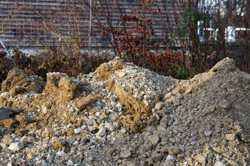 mound with excavated soil at a construction site