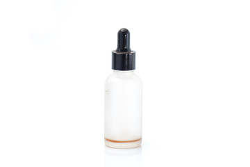 Empty transparent vape liquid bottle with residue isolated on the white background