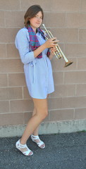 Female jazz and classical trumpet player.