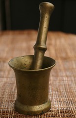 Old mortar made of metal for grinding products into manual