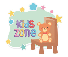 kids zone, teddy bear sitting on chair