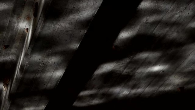 Surreal clip of moving water reflected on a dark ceiling