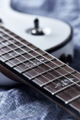 Fototapeta premium Fretboard of modern electric guitar. Close up. 