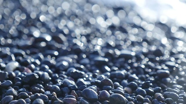  black beach pebble waves sea