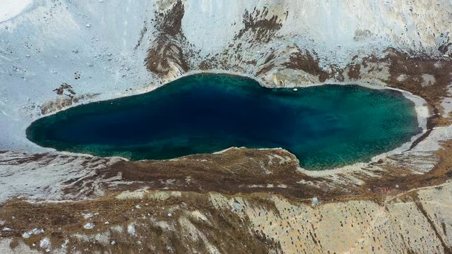 4K aerial view of Five color lake in Daocheng Yading nature reserve in Sichuan, Yunnan, China
