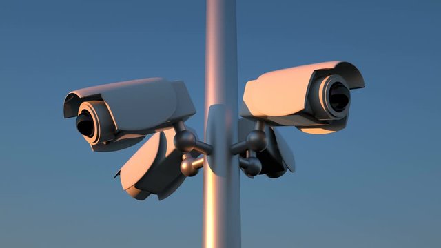 Observation tower. A pillar with four cameras observes 360 degrees at sunset. Prison surveillance. Seamless loop.