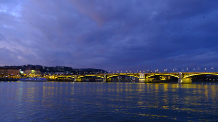 Panoramic view of illuminated Margaret (Margit) bridge at night in Budapest, Hungary