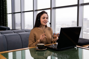 girl leads some online broadcast from the coffee shop