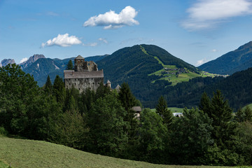 castle in the alps mountains in summer