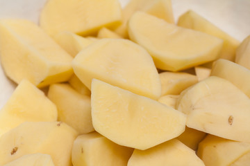 Fresh,Sliced, peeled  potatoes
