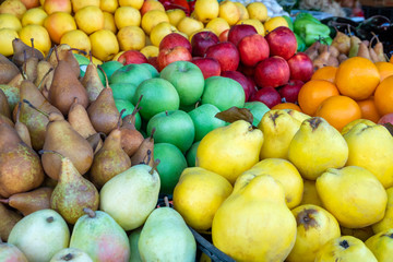 Various fresh fruits at farmer market. Vitamin.