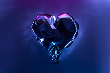 Background with abstrackt balloon heart of purple and blue neon lights . Backdrop for your design....