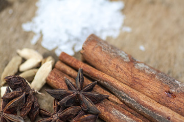 spices and salt on wood
