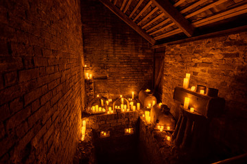Candle lit room with many candles at night beauty