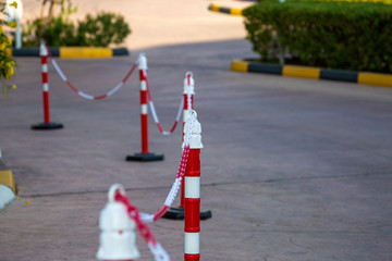 red posts for pedestrians on the road