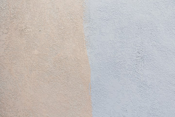 Cream and purple concrete wall background texture