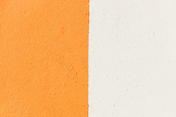 White  orange split color concrete background backdrop texture