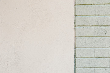 Fototapeta premium White concrete wall with green brick background texture