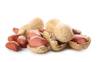 Tasty peanuts on white background
