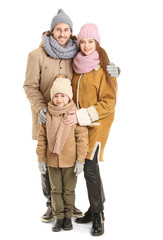 Fototapeta na wymiar Happy family in winter clothes on white background