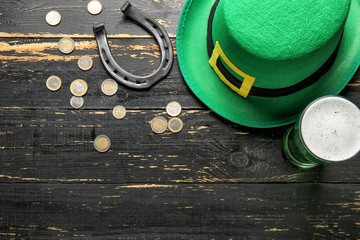 Composition for St. Patrick's Day on wooden background
