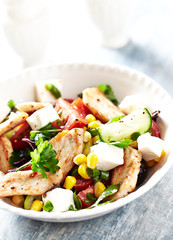 Healthy Salad with Chicken Briest, Feta Cheese, Blcak Olives, Cucumber, Red Pepper and Sweet Corn.