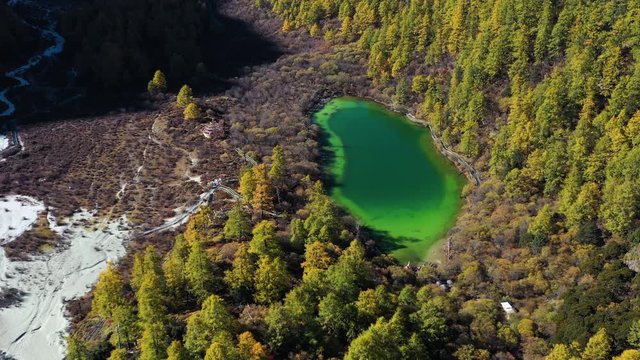 4K aerial view of Pearl lake in Daocheng Yading nature reserve in Sichuan, Yunnan, China