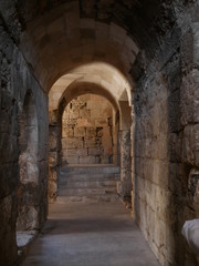 Fototapeta na wymiar Stone arch in the Roman theatre of Amman, Jordan, ancient historic monumental building in the Middle East