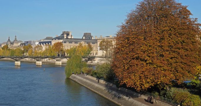 Paris and the river Seine from the Pont Neuf, ile de la Cit&eacute;, France. In the background are the pont des Arts and the louvre museum building..
