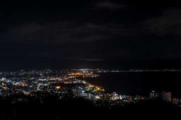 Fototapeta na wymiar 立石公園から見る諏訪湖と夜景