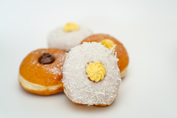 Donuts with creams, coconuts and nutella