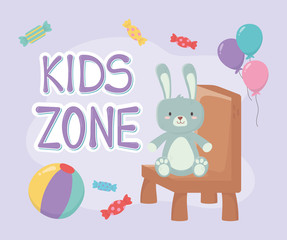 Obraz na płótnie Canvas kids zone, cute rabbit sitting on chair